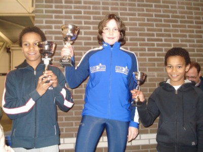 Een oude foto van Daidai Ntab (links) en Thomas van Dijk (midden) op het podium van de Clubkampioenschappen in 2008.